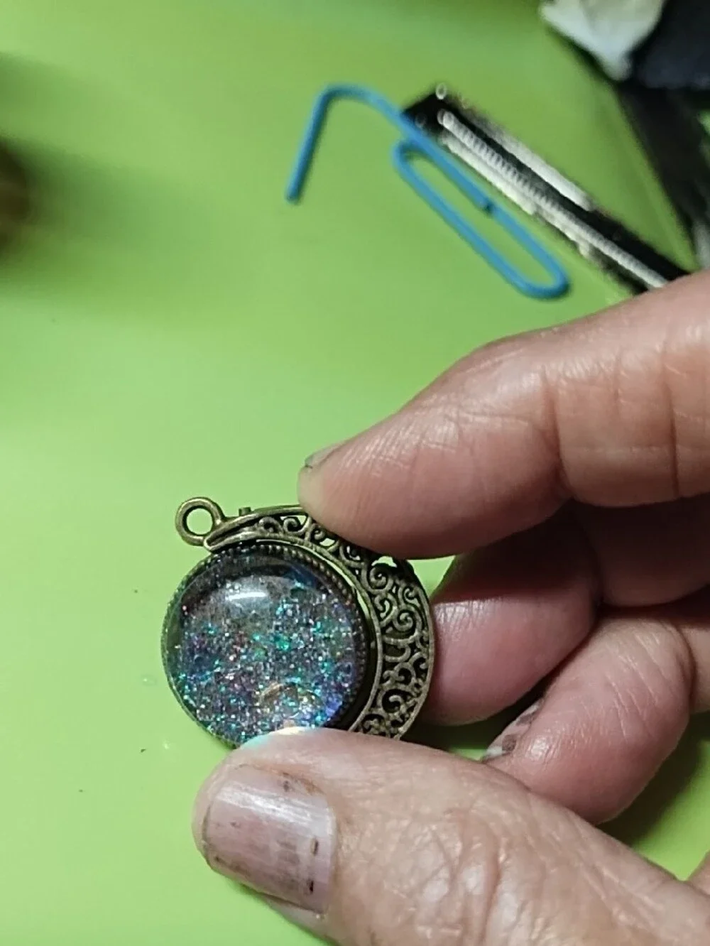 Handcrafted Bronze Moon Pendant with Iridescent Glitter Resin
